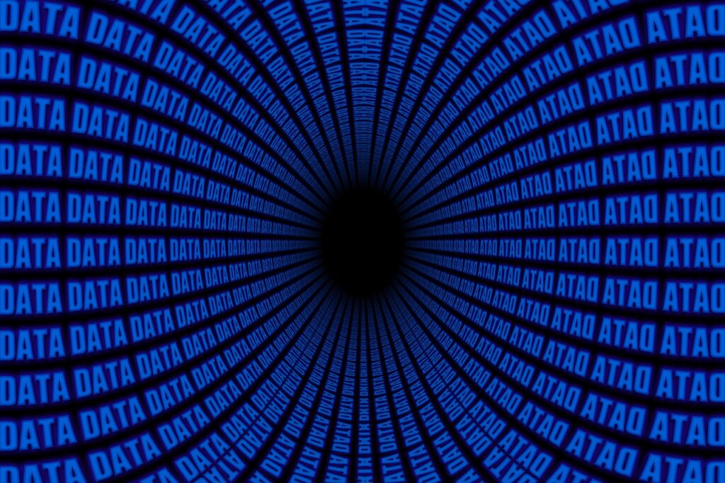 Abstract blue data tunnel graphic symbolizing automotive big data flow, analytics, and digital information processing in the transportation industry.